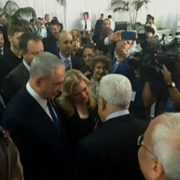 prime minister benjamin netanyahu and palestinian authority president mahmoud abbas speak at the funeral of shimon peres in jerusalem on september 30 2016 photo channel 2 screen grab prime minister benjamin netanyahu and palestinian authority president mahmoud abbas speak at the funeral of shimon peres in jerusalem on september 30 2016 photo channel 2 screen grab