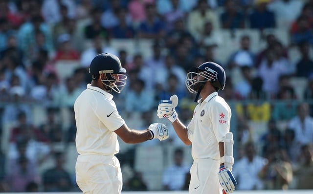 india 039 s ajinkya rahane and cheteshwar pujara punch their fists during the first day of the second test match between india and new zealand at the eden gardens cricket stadium in kolkata on september 30 2016 photo afp india 039 s ajinkya rahane and cheteshwar pujara punch their fists during the first day of the second test match between india and new zealand at the eden gardens cricket stadium in kolkata on september 30 2016 photo afp
