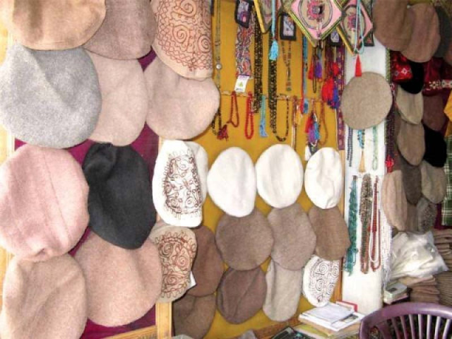 cultural caps at display at shop in gilgit baltistan photo express cultural caps at display at shop in gilgit baltistan photo express