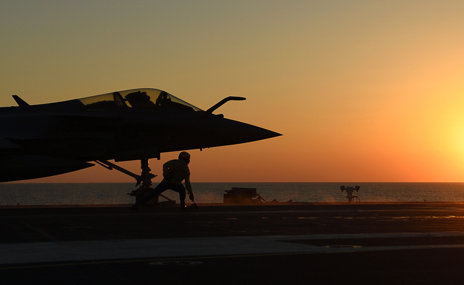 this picture taken shows rafale marine combat aircraft being catapulted from the french aircraft carrier charles de gaulle as it sails in the mediterranean sea as part of the operation arromanches iii photo afp