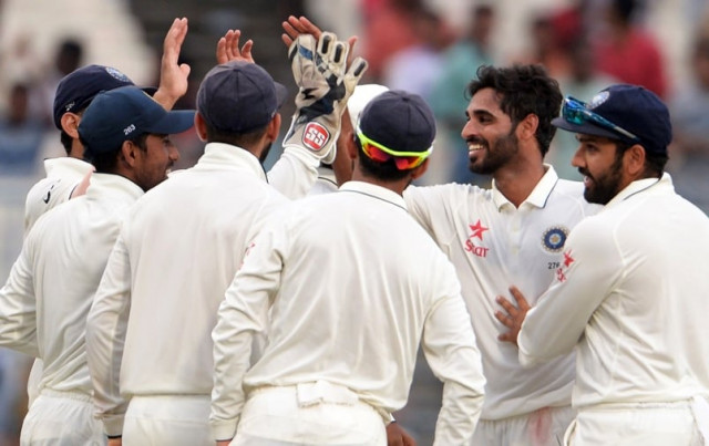 india 039 s bhuvneshwar kumar 2r with teammates celebrate after the wicket of new zealand 039 s matt henry during the second day of the second test match between india and new zealand at the eden gardens cricket stadium in kolkata on october 1 2016 fast bowler bhuvneshwar kumar claimed five wickets to leave new zealand tottering at 128 for seven at stumps as india gained the upper hand in the second test on a rain hit day two in kolkata photo afp india 039 s bhuvneshwar kumar 2r with teammates celebrate after the wicket of new zealand 039 s matt henry during the second day of the second test match between india and new zealand at the eden gardens cricket stadium in kolkata on october 1 2016 fast bowler bhuvneshwar kumar claimed five wickets to leave new zealand tottering at 128 for seven at stumps as india gained the upper hand in the second test on a rain hit day two in kolkata photo afp