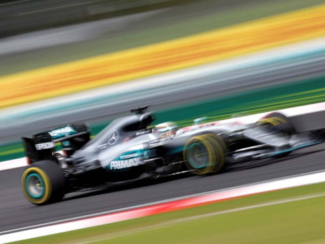 hamilton heads into today s race chasing his 50th career win and hoping to end rosberg s streak of three wins from the last three races photo reuters