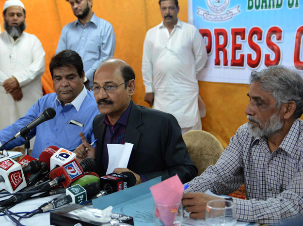 bsek chairperson anwar ahmed zai centre at a press conference photo express