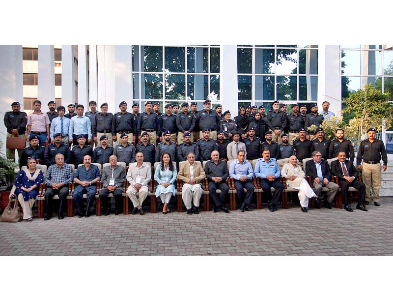 minister for information parvaiz rashid in a group photograph with the participants of the two day workshop on media briefing for punjab police photo app
