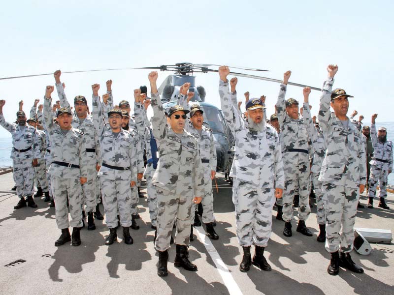 commander of pakistan fleet vice admiral arifullah hussaini chants the national slogan with the officers and men of navy photo pakistan navy