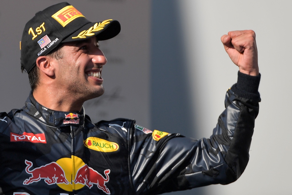 daniel ricciardo celebrates taking first place at the formula one malaysian gp in sepang on october 2 2016 photo afp