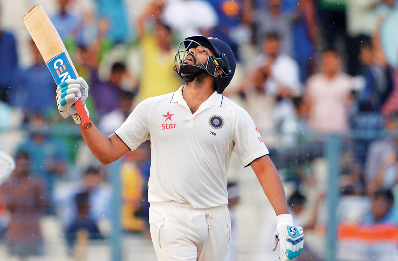 sharma put on 103 runs with saha to get india s second innings back on track after the new zealand seamers rattled the indian top order with regular wickets photo afp