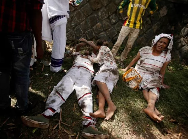 injured protesters wait for help after several people died during the irrechaa the thanks giving festival of the oromo people in bishoftu town of oromia region ethiopia october 2 2016 photo reuters injured protesters wait for help after several people died during the irrechaa the thanks giving festival of the oromo people in bishoftu town of oromia region ethiopia october 2 2016 photo reuters