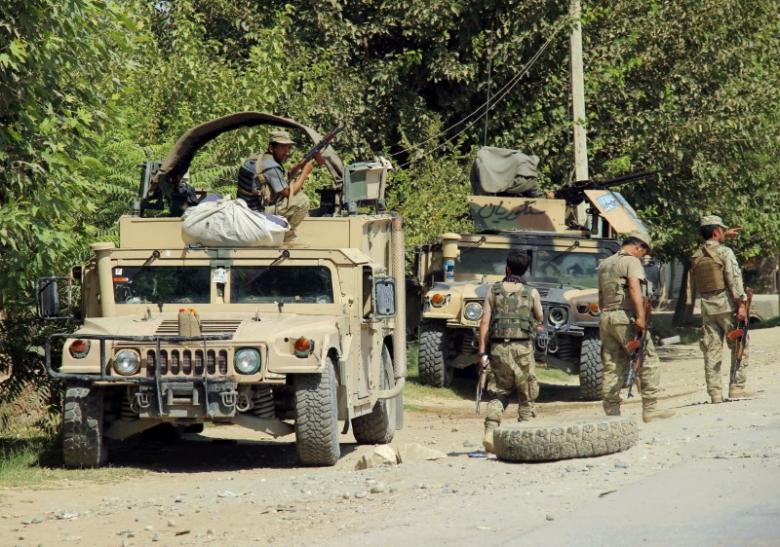 afghan security forces prepare themselves during a battle with insurgents on the outskirts of kunduz afghanistan august 21 2016 photo reuters