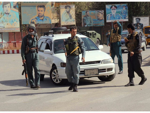 afghan policemen keep watch in the downtown of kunduz city afghanistan october 3 2016 photo reuters afghan policemen keep watch in the downtown of kunduz city afghanistan october 3 2016 photo reuters
