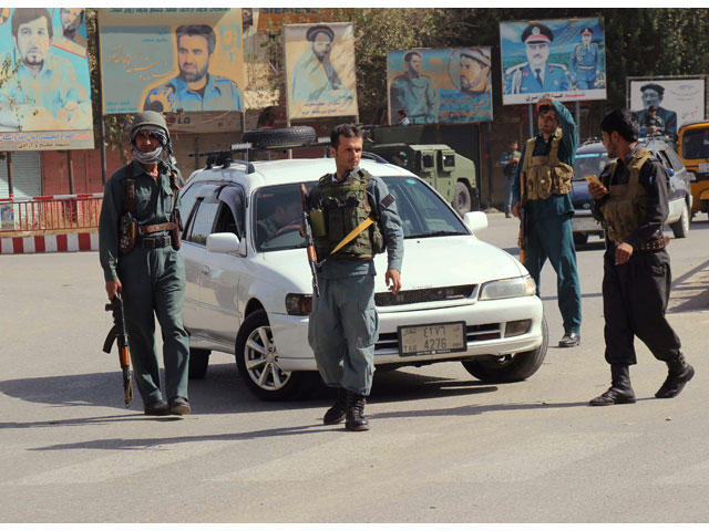 afghan policemen keep watch in the downtown of kunduz city afghanistan october 3 2016 photo reuters