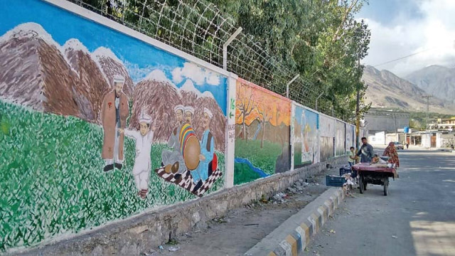 a view of the wall painted by students from lahore and gilgit as part of street art competition organised by gilgit baltistan government to promote local culture photos express