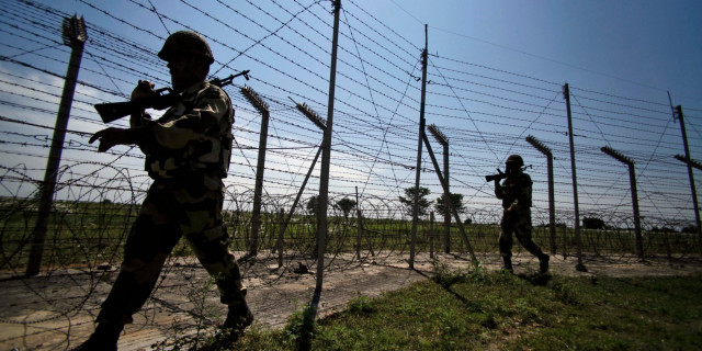 india s border security force bsf soldiers patrol near the india pakistan international border fencing at garkhal about 35 kilometers west of jammu photo ap india s border security force bsf soldiers patrol near the india pakistan international border fencing at garkhal about 35 kilometers west of jammu photo ap