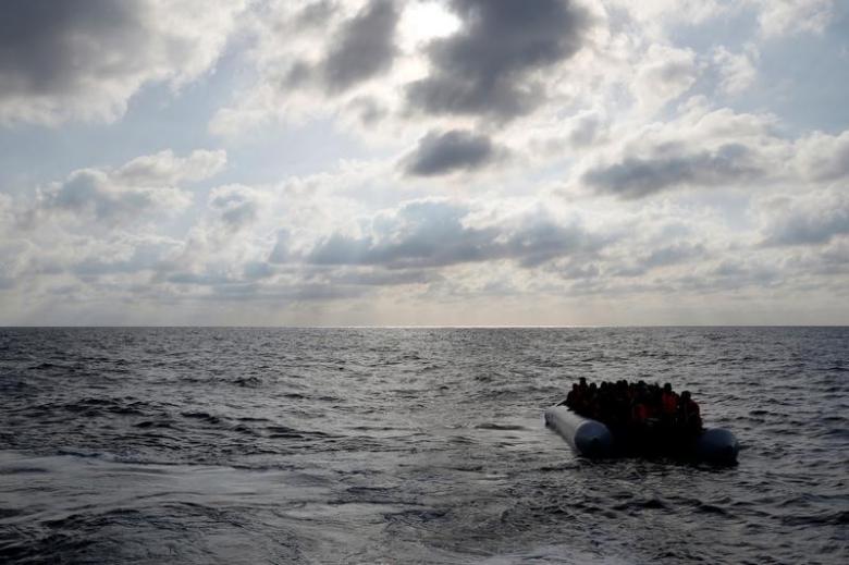 migrants in a dinghy await rescue around 20 nautical miles off the coast of libya june 2016 photo reuters