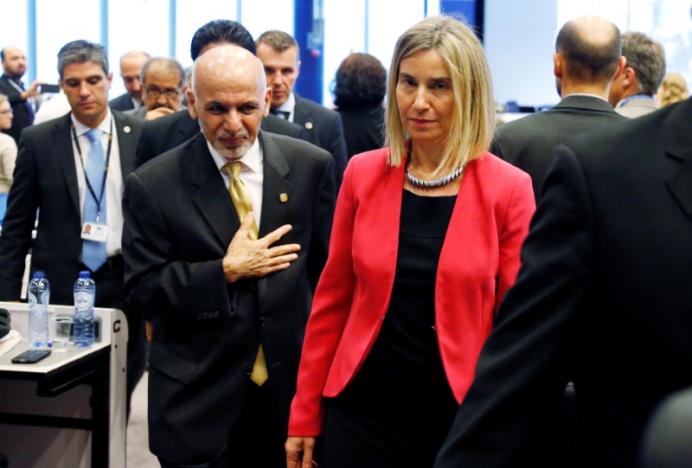 afghanistan 039 s president ashraf ghani walks with european union foreign policy chief federica mogherini during the brussels conference on afghanistan belgium october 4 2016 photo reuters