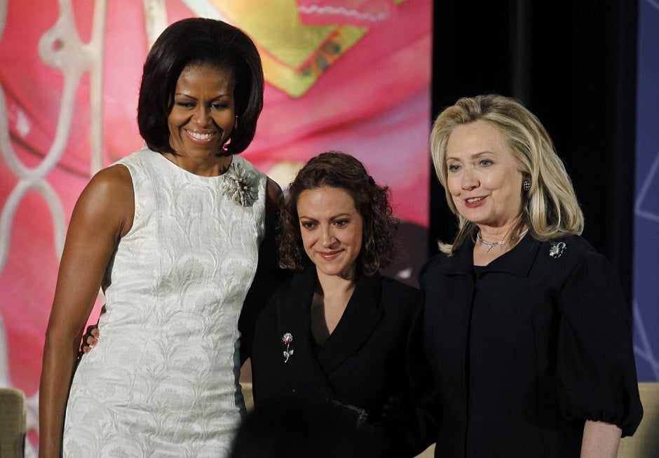 u s secretary of state hillary clinton and first lady michelle obama l congratulate jineth bedoya lima of colombia during the state department 039 s 2012 international women of courage award winners photo reuters