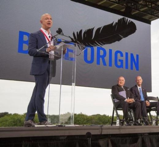 amazon founder and blue origin founder jeff bezos l announces plans to build a rocket manufacturing plant and launch site at cape canaveral air force station florida september 15 2015 photo reuters