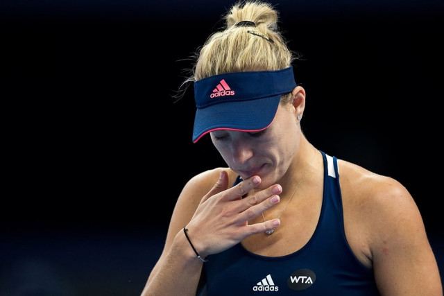angelique kerber after losing a point to elina svitolina in beijing on october 6 2016 photo afp angelique kerber after losing a point to elina svitolina in beijing on october 6 2016 photo afp