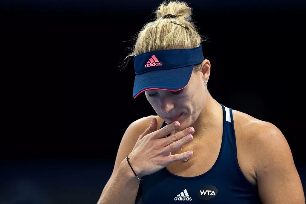 angelique kerber after losing a point to elina svitolina in beijing on october 6 2016 photo afp angelique kerber after losing a point to elina svitolina in beijing on october 6 2016 photo afp