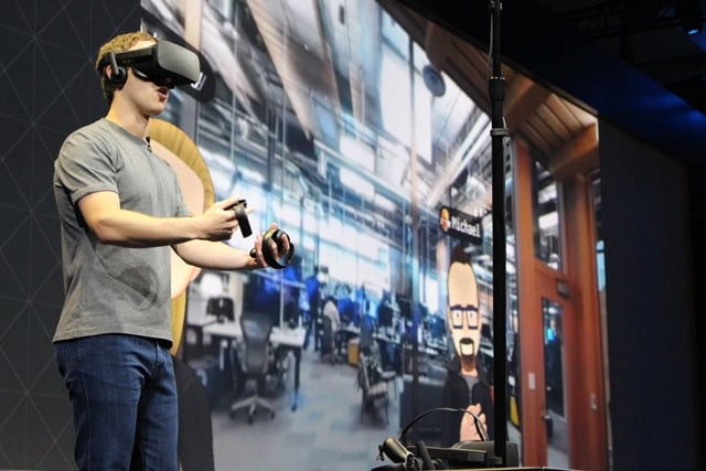 facebook co founder and chief executive mark zuckerberg speaks at an oculus developers conference while wearing a virtual reality headset in san jose california on october 6 2016 photo afp facebook co founder and chief executive mark zuckerberg speaks at an oculus developers conference while wearing a virtual reality headset in san jose california on october 6 2016 photo afp