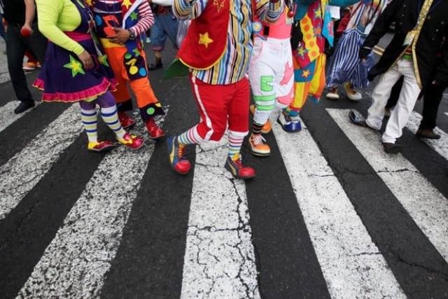 clowns participate in a parade during the viii central america clown convention in san salvador el salvador photo reuters clowns participate in a parade during the viii central america clown convention in san salvador el salvador photo reuters