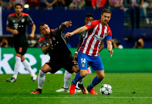 atletico madrid 039 s gabi r in action with bayern munich 039 s arturo vidal l photo reuters atletico madrid 039 s gabi r in action with bayern munich 039 s arturo vidal l photo reuters