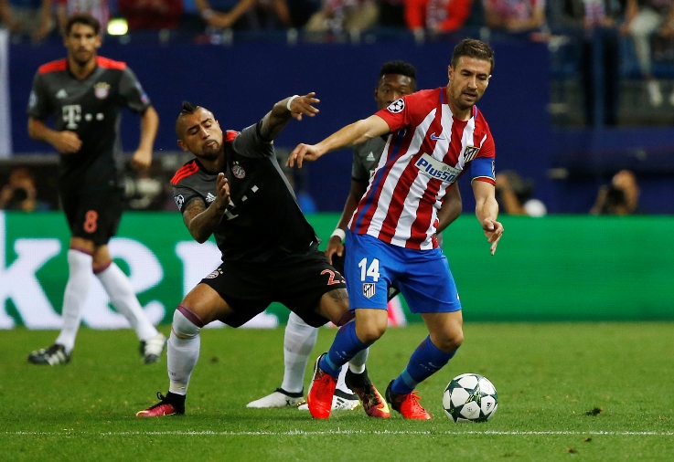 atletico madrid 039 s gabi r in action with bayern munich 039 s arturo vidal l photo reuters