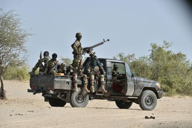 nigerien soldiers pictured patrolling near the nigerian border in 2015 when the country was first plagued by boko haram attacks in its southeast region photo afp