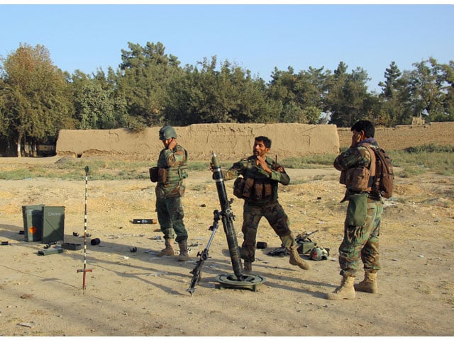 afghan national army ana soldiers fire a mortar round at taliban positions during a battle with taliban in kunduz provice afghanistan october 8 2016 photo reuters