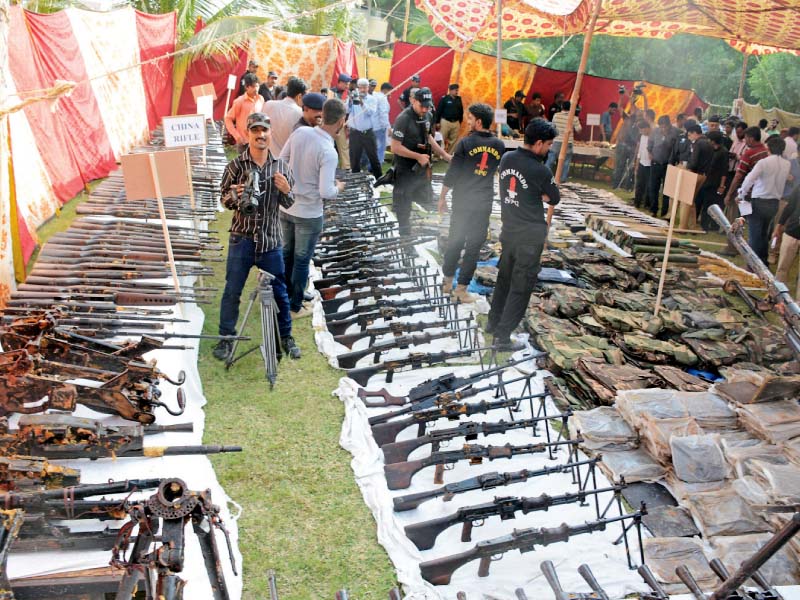 these weapons were found from a 10 by 10 feet tank of a 120 square yard house in azizabad on wednesday photo file