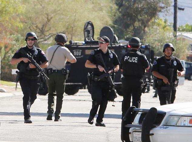 armed police officers are shown during a standoff where three officers were shot by a suspect in palm springs california us october 8 2016 photo reuters