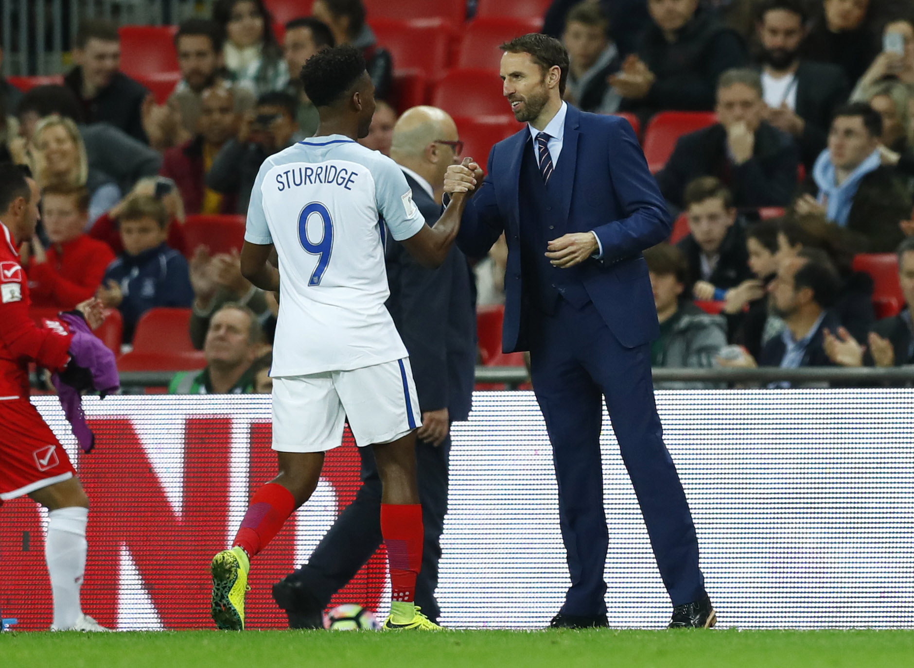 england interim manager gareth southgate l shakes the hand of daniel sturridge as he is substituted off photo reuters