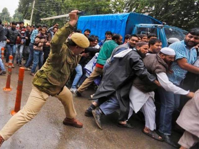 on saturday indian occupied kashmir s main city came under curfew after thousands clashed with govt forces photo reuters file