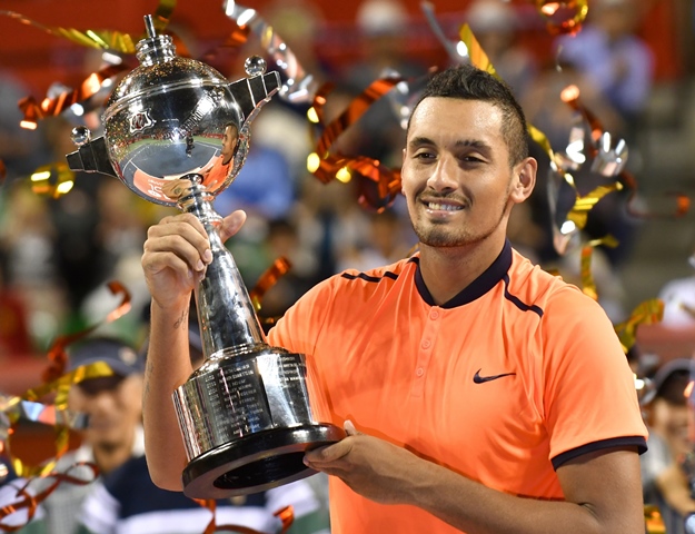 nick kyrgios celebrates at the atp japan open in tokyo on october 9 2016 photo afp