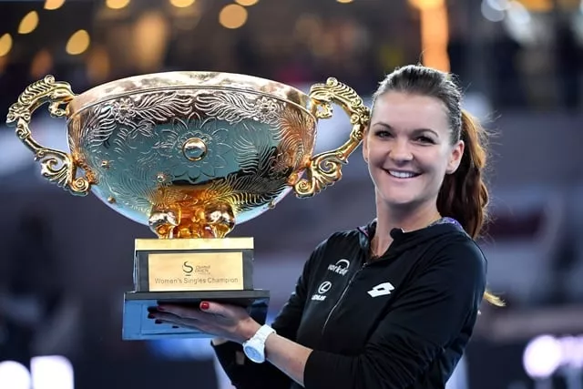 agnieszka radwanska poses with her trophy in beijing on october 9 2016 photo afp agnieszka radwanska poses with her trophy in beijing on october 9 2016 photo afp