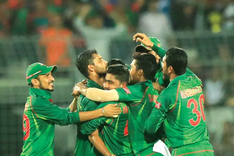 bangladesh cricketers congratulate mortaza 2l after he went through stokes defences to hit timber and leave the visitors in trouble at 29 4 in the second odi photo afp bangladesh cricketers congratulate mortaza 2l after he went through stokes defences to hit timber and leave the visitors in trouble at 29 4 in the second odi photo afp