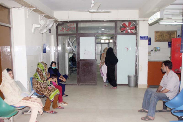 patients wait for checkups outside a ward at the hospital photo abid nawaz express patients wait for checkups outside a ward at the hospital photo abid nawaz express