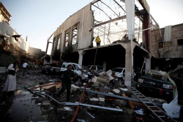 people stand at the site of an airstrike which witnesses said was by saudi led coalition aircraft on mourners at a hall where a wake for the father of jalal al roweishan the interior minister in the houthi dominated yemeni government was being held in sanaa yemen photo reuters people stand at the site of an airstrike which witnesses said was by saudi led coalition aircraft on mourners at a hall where a wake for the father of jalal al roweishan the interior minister in the houthi dominated yemeni government was being held in sanaa yemen photo reuters