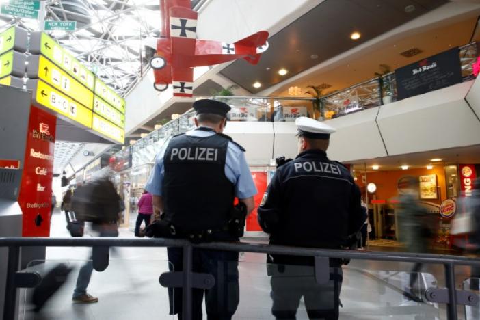 german policemen guard the main terminal of berlin tegel airport photo reuters
