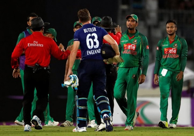 bangladesh players exchange words with england stand in captain jos buttler after he was dismissed during the second odi on october 9 2016 photo reuters bangladesh players exchange words with england stand in captain jos buttler after he was dismissed during the second odi on october 9 2016 photo reuters