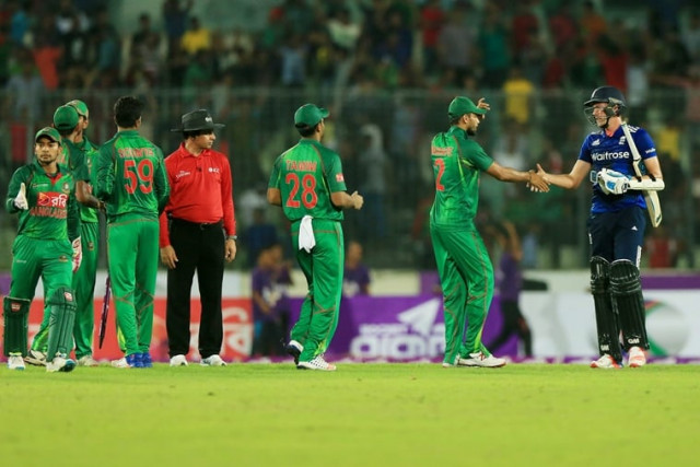 bangladesh cricketer mashrafe mortaza 2r shakes hand with england jake ball r during the second one day international odi cricket match between england and bangladesh at the sher e bangla national cricket stadium in dhaka on oct 9 2016 photo afp bangladesh cricketer mashrafe mortaza 2r shakes hand with england jake ball r during the second one day international odi cricket match between england and bangladesh at the sher e bangla national cricket stadium in dhaka on oct 9 2016 photo afp