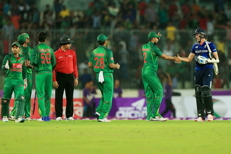 bangladesh cricketer mashrafe mortaza 2r shakes hand with england jake ball r during the second one day international odi cricket match between england and bangladesh at the sher e bangla national cricket stadium in dhaka on oct 9 2016 photo afp