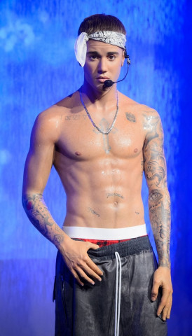 london 039 s madame tussauds unveiled figure which features bieber shirtless with sweat glistening on his tattooed torso photo twitter madametussauds london 039 s madame tussauds unveiled figure which features bieber shirtless with sweat glistening on his tattooed torso photo twitter madametussauds