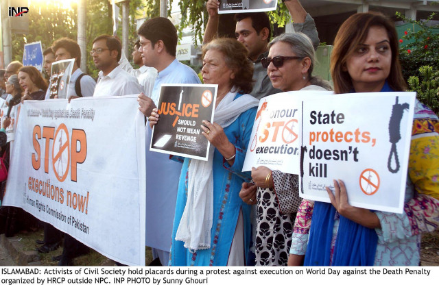 activists of civil society hold placards during a protest against a execution on world day against the death penalty organized by hrcp outside npc photo inp activists of civil society hold placards during a protest against a execution on world day against the death penalty organized by hrcp outside npc photo inp