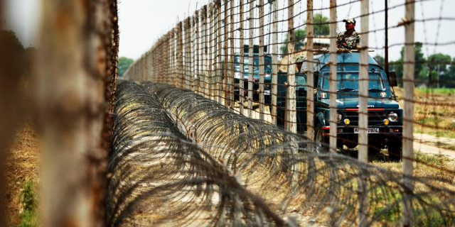 indian border security force soldiers patrol near the india pakistan international border fence photo ap indian border security force soldiers patrol near the india pakistan international border fence photo ap
