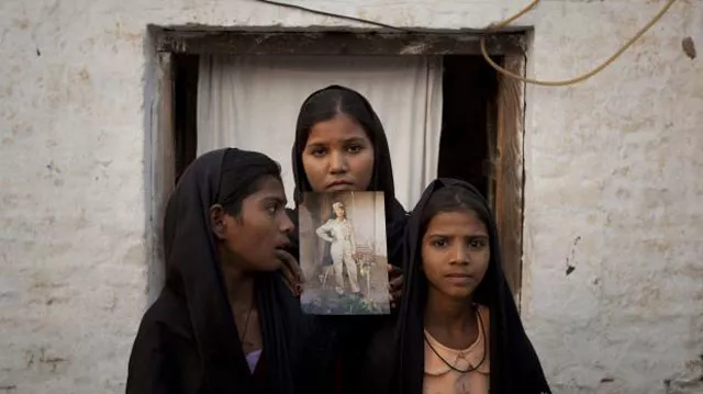 the daughters of asia bibi pictured here in 2010 pose with an image of their mother photo reuters the daughters of asia bibi pictured here in 2010 pose with an image of their mother photo reuters
