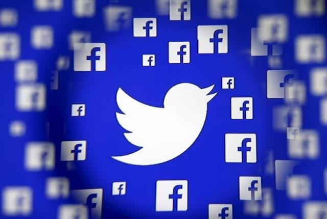 logo of the twitter and facebook are seen through magnifier on display in this illustration taken in sarajevo bosnia and herzegovina photo reuters logo of the twitter and facebook are seen through magnifier on display in this illustration taken in sarajevo bosnia and herzegovina photo reuters