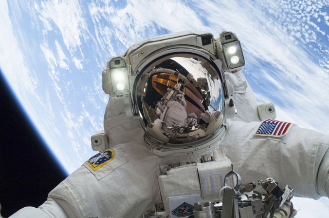 us astronaut mike hopkins participates in a spacewalk outside the international space station in december 2013 photo nasa reuters