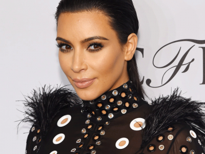 kim kardashian sues over claims she faked paris robbery