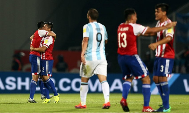 paraguay 039 s players celebrate their goal next to argentina 039 s gonzalo higuain on ocotber 11 2016 photo reuters